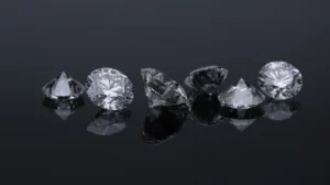 Sparkling diamonds arranged on a dark background