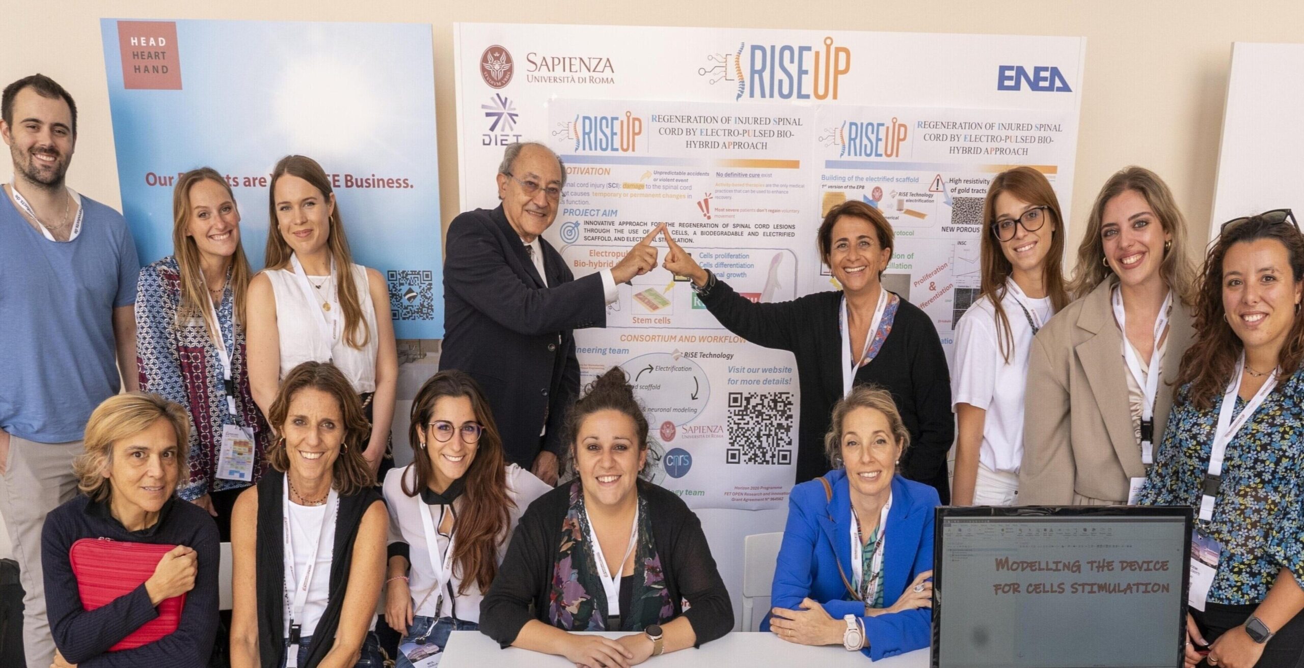 Members of the ENEA, Sapienza University, and CNRS teams presenting at the project booth during a conference, showcasing their latest research and innovations.
