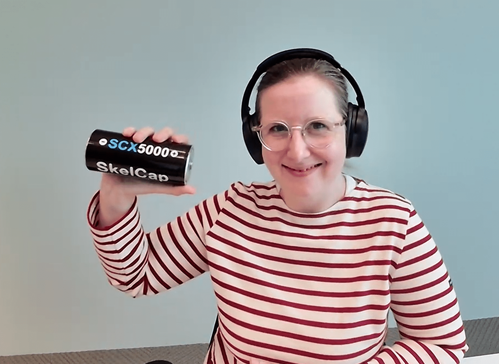 Patricia Godel holding a SuperBattery X-CAP